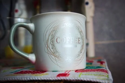 Cup of coffee on the kitchen table Foto stock