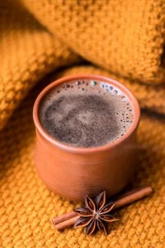 Cup of coffee on the knitted background. Stock Photos