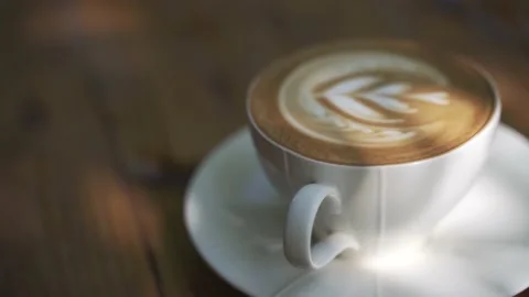 Cup of coffee with latte art Stock Footage 139027113