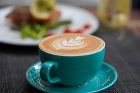 A cup of Coffee Latte on the table Stock Photos