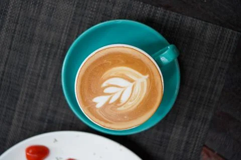 A cup of Coffee Latte on the table Stock Photos