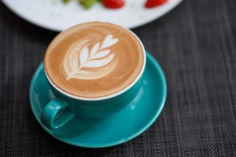 A cup of Coffee Latte on the table Stock Photos