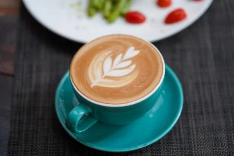 A cup of Coffee Latte on the table Stock Photos
