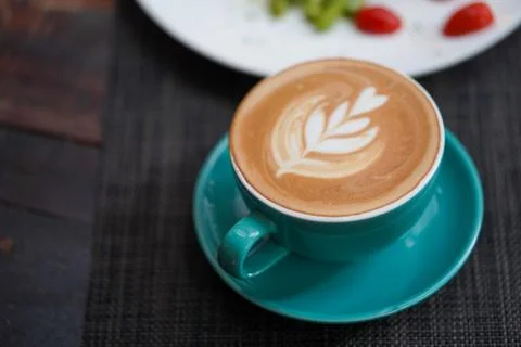 A cup of Coffee Latte on the table Stock Photos
