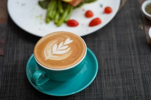 A cup of Coffee Latte on the table Stock Photos