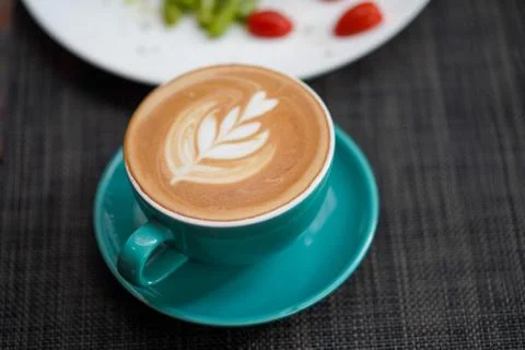 A cup of Coffee Latte on the table Stock Photos