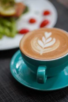 A cup of Coffee Latte on the table Stock Photos
