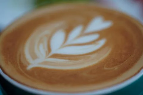 A cup of Coffee Latte on the table Stock Photos
