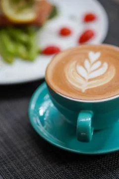 A cup of Coffee Latte on the table Stock Photos