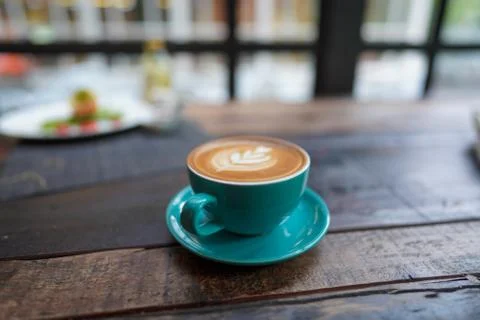 A cup of Coffee Latte on the table Stock Photos