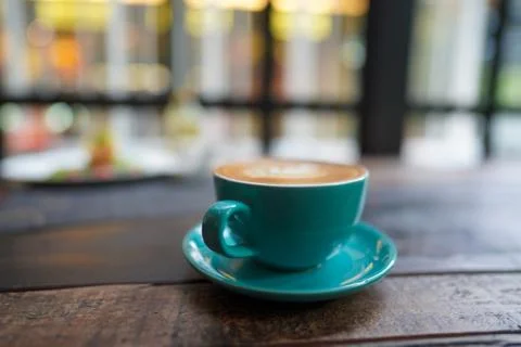 A cup of Coffee Latte on the table Stock Photos