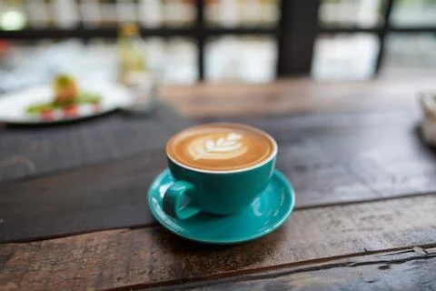 A cup of Coffee Latte on the table Stock Photos