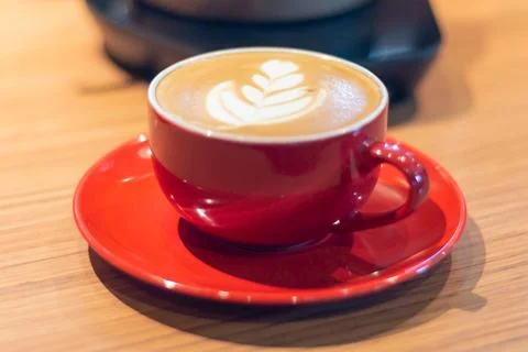 Cup of coffee latte on table with selective focus Foto stock