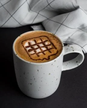 A cup of coffee latte on wooden table Stock Photos