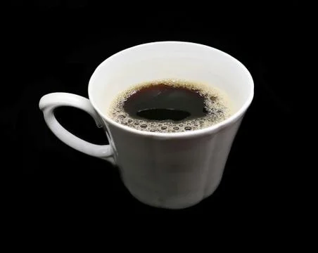 A Cup of coffee made of white ceramic with a film isolated on a black backgro Foto stock