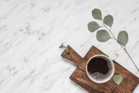 Cup of coffee on a marble surface with copy-space Foto stock