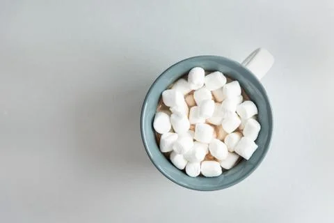 Cup of coffee with marshmallows, top copy space Stock Photos