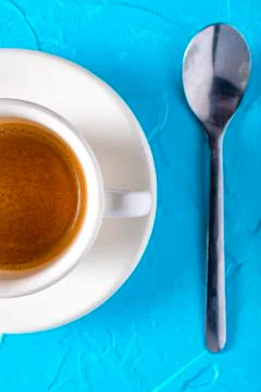 Cup of coffee with milk on a blue Stock Photos