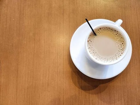 Cup of coffee with milk Stock Photos