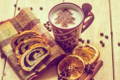 Cup of coffee with a new year pattern. Christmas tree made of cinnamon in ... Stock Photos