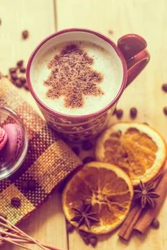 Cup of coffee with a new year pattern. Christmas tree made of cinnamon in ... Stock Photos