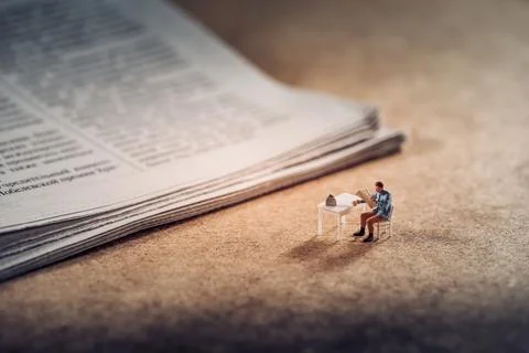 Cup of coffee with newspaper Stock Photos