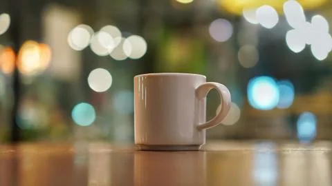 Cup of coffee at night time Stock Photos