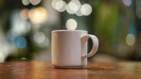 Cup of coffee at night time Stock Photos