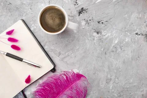 Cup of coffee, opened notepad and pen, stationery Stock Photos