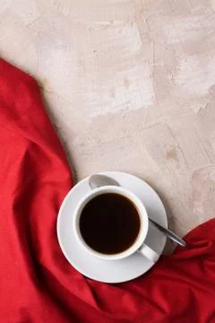 Cup of coffee or tea red napkin concrete background Stock Photos