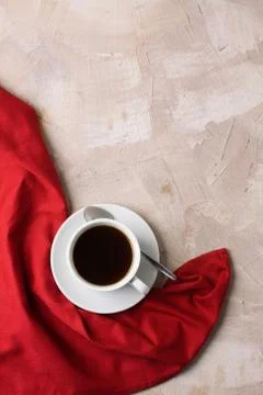Cup of coffee or tea red napkin concrete background Stock Photos