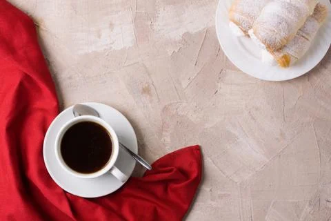 Cup of coffee or tea red napkin concrete background Stock Photos