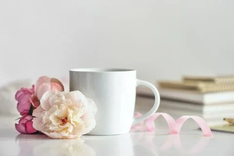 Cup of coffee or tea on working desk Stock Photos