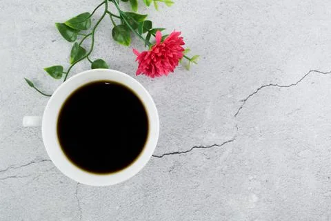 A cup of coffee over grey background with copy space. Stock Photos