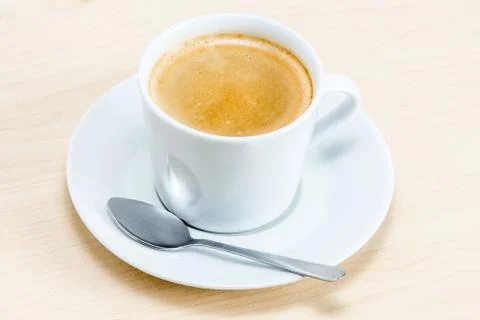 Cup of coffee with piece Stock Photos