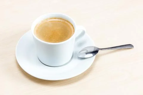 Cup of coffee with piece Stock Photos