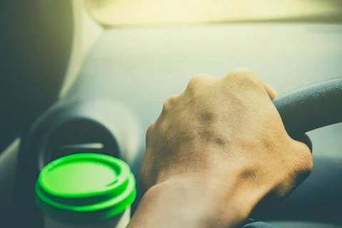 Cup coffee put on front console of a car Stock Photos