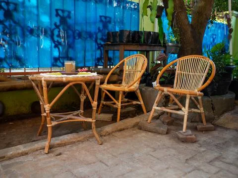 A cup of coffee on a rattan table Stock Photos