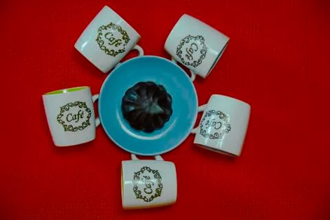 Cup of coffee on red background  Stock Photos