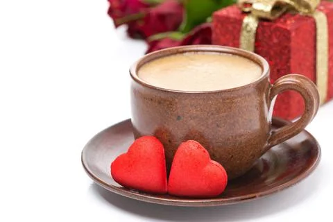 Cup of coffee, red candy, gift and roses for Valentine's Day, isolated on whi Stock Photos