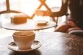 The cup of coffee on the restaurant table Photo