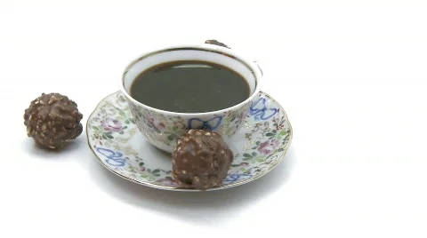 Cup of coffee rotating with chocolate  Video stock 314129