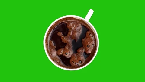 Cup of coffee rotating on the green screen Stock Footage 240621077