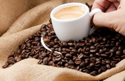 Cup of coffee on a sack Stock Photos