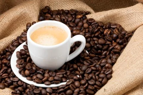 Cup of coffee on a sack Foto stock
