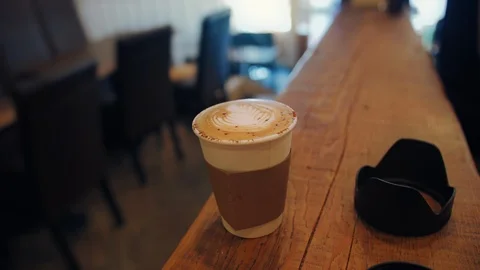 Cup of coffee served to go Stock Footage 115254312