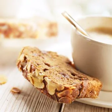 Cup of coffee served with suger bread and almonds Stock Photos