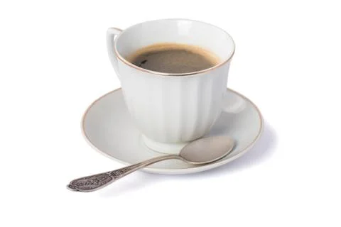 Cup of coffee with silver spoon Isolated on white Stock Photos