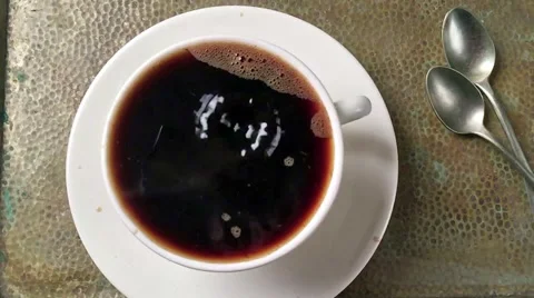 Cup of coffee slow motion Stock Footage 58724076