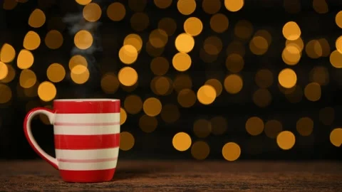 Cup of coffee with smoke on bokeh background. 動画素材 139506574